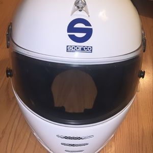 White Sparco helmet and sparco gloves